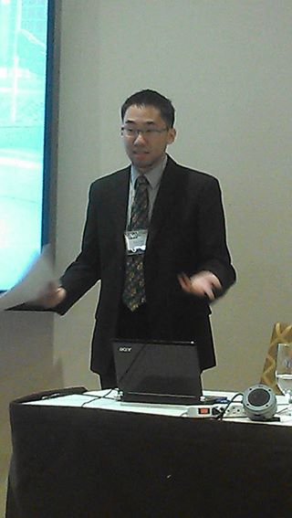 Tim Choi presents on rapid manufacturing. Too bad we did not get a shot of him with the fork. 